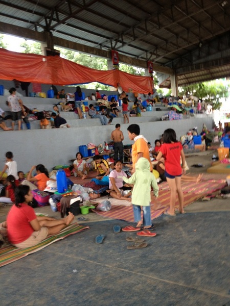 READY FOR PABLO: Residents of Macasandig and other areas of Cagayan de Oro have learned their lesson from Typhoon Sendong that killed more than a thousand people last year. As early as Monday, they have sought refuge in evacuation centers, such as this one in Macasandig Covered Court, fearing flash floods and landslides. Photo by Pinky Fabe