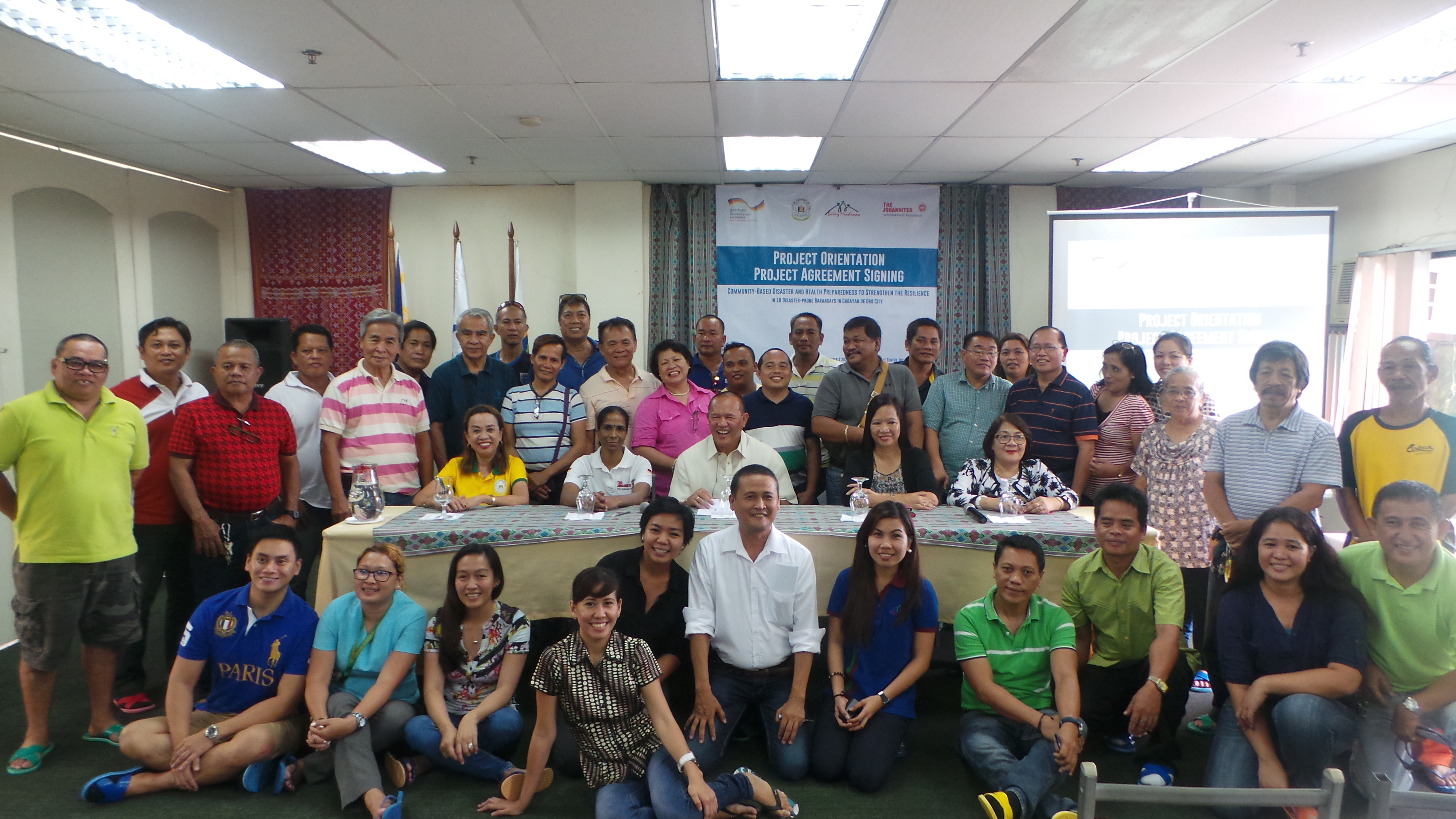Representatives from the 18 partner barangays pose for a picture with partners from Balay Mindanaw, Johanniter International, the City LGU, the City Health Office and the City DILG.
